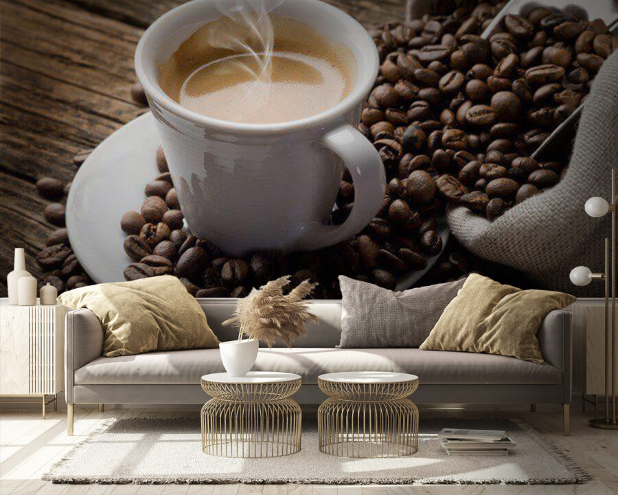 Cup of coffee on a saucer with coffee beans