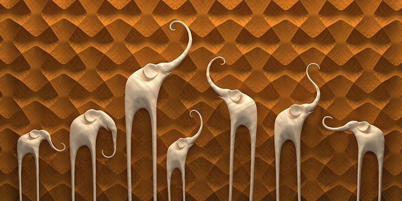 Group of elephants on a wall