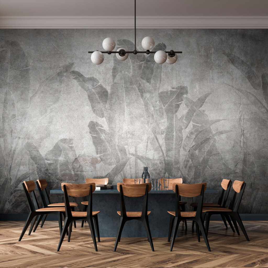 Grey wall with leaves and a brick wall