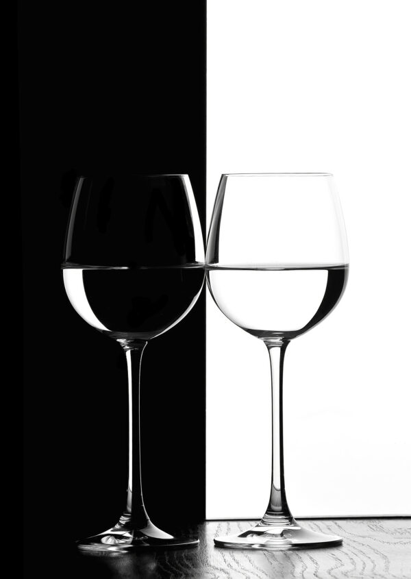 Two wine glasses with water in them Two wine glasses with water in them