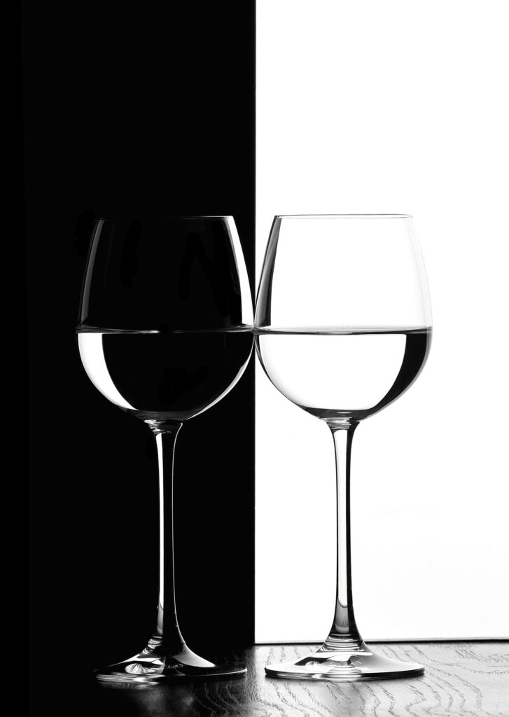 Two wine glasses with water in them Two wine glasses with water in them