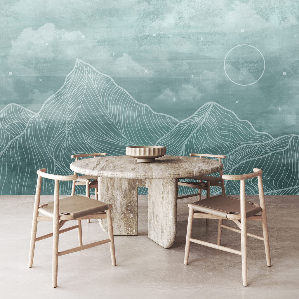 A mountain range with clouds and sun