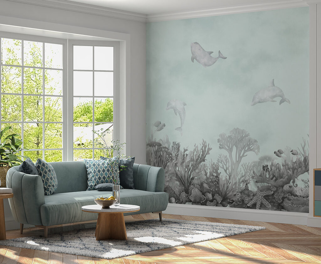 A group of dolphins swimming in the ocean A group of dolphins swimming in the ocean