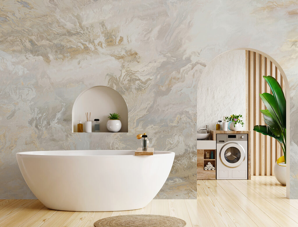 Couple of cranes flying next to a tree