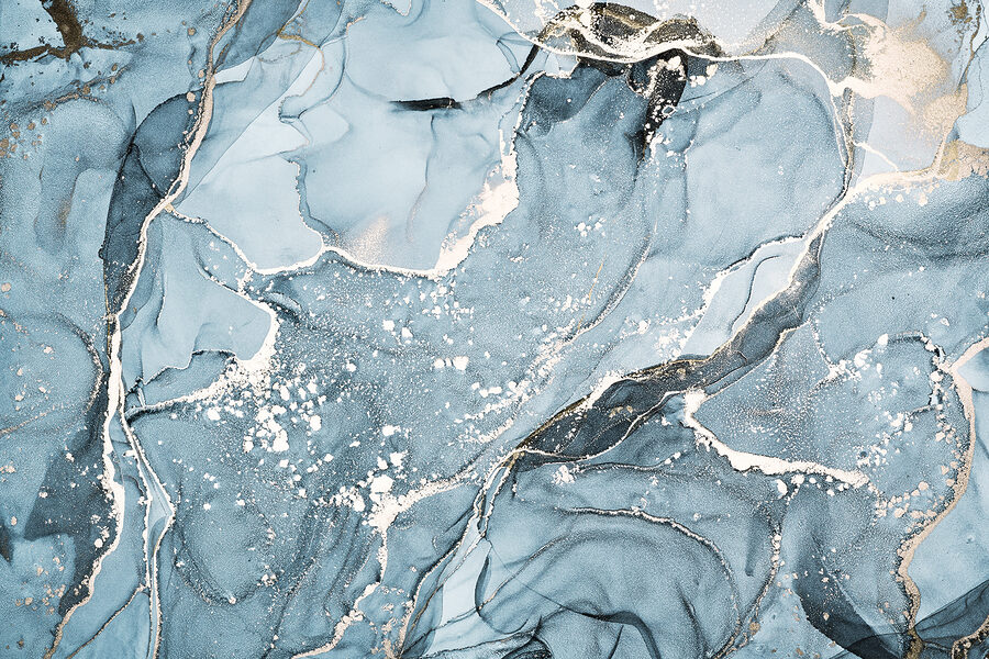 A blue and gold marbled surface