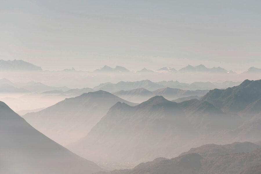 A mountain range with fog A mountain range with fog