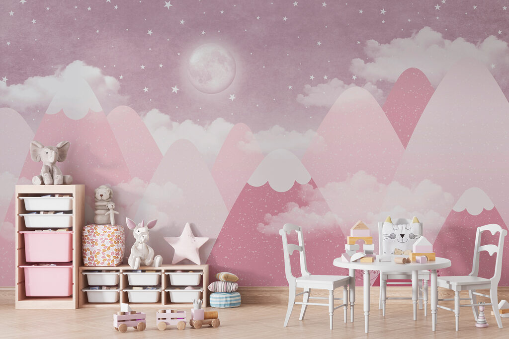 A moon and clouds over mountains