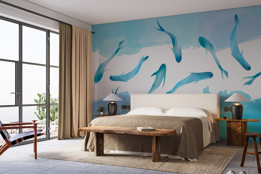 Wall murals A group of blue fish swimming in water