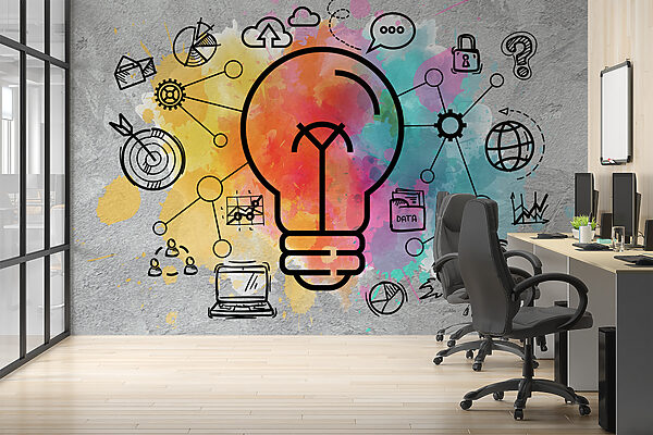 A light bulb with a colorful background A light bulb with a colorful background