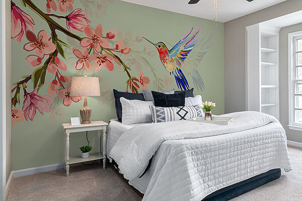w00693pib2mr 600x400 - A bird flying next to flowers - tegory