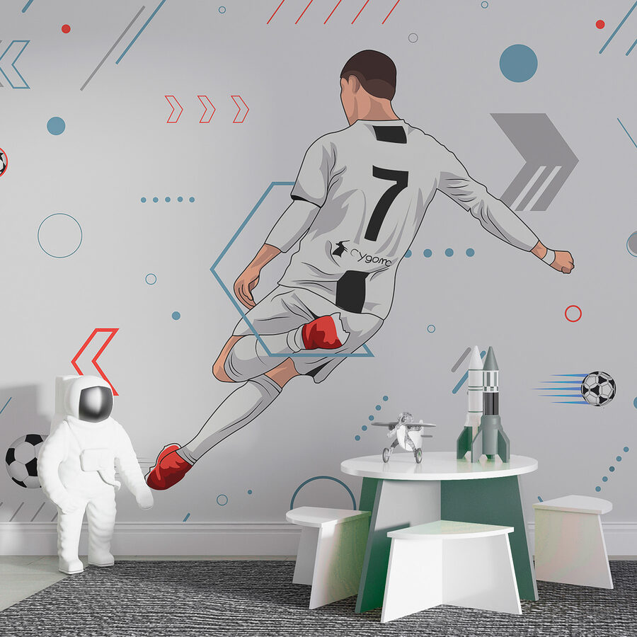 Wall murals A football player kicking a ball
