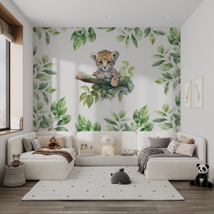 A watercolor of a baby leopard on a tree branch