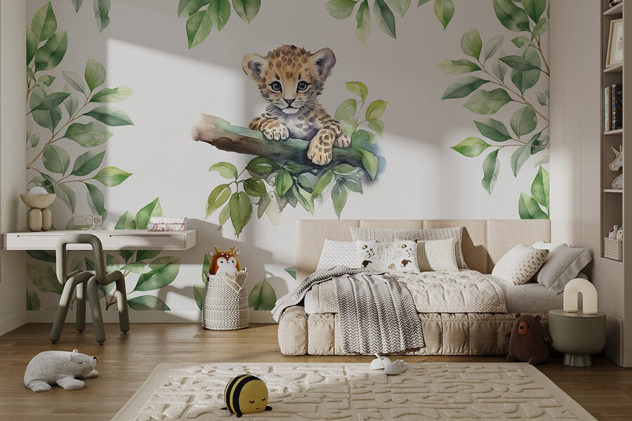 A watercolor of a baby leopard on a tree branch