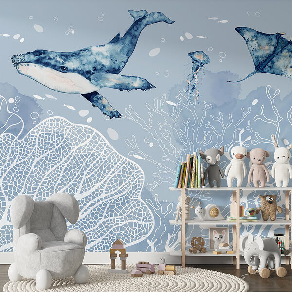 A whale and stingrays swimming in the ocean A whale and stingrays swimming in the ocean