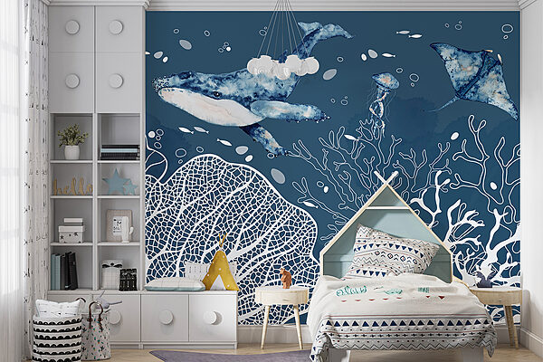 A whale and stingrays swimming in the ocean A whale and stingrays swimming in the ocean