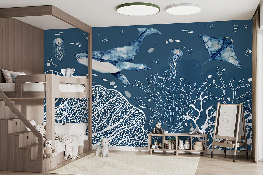 A whale and stingrays swimming in the ocean A whale and stingrays swimming in the ocean