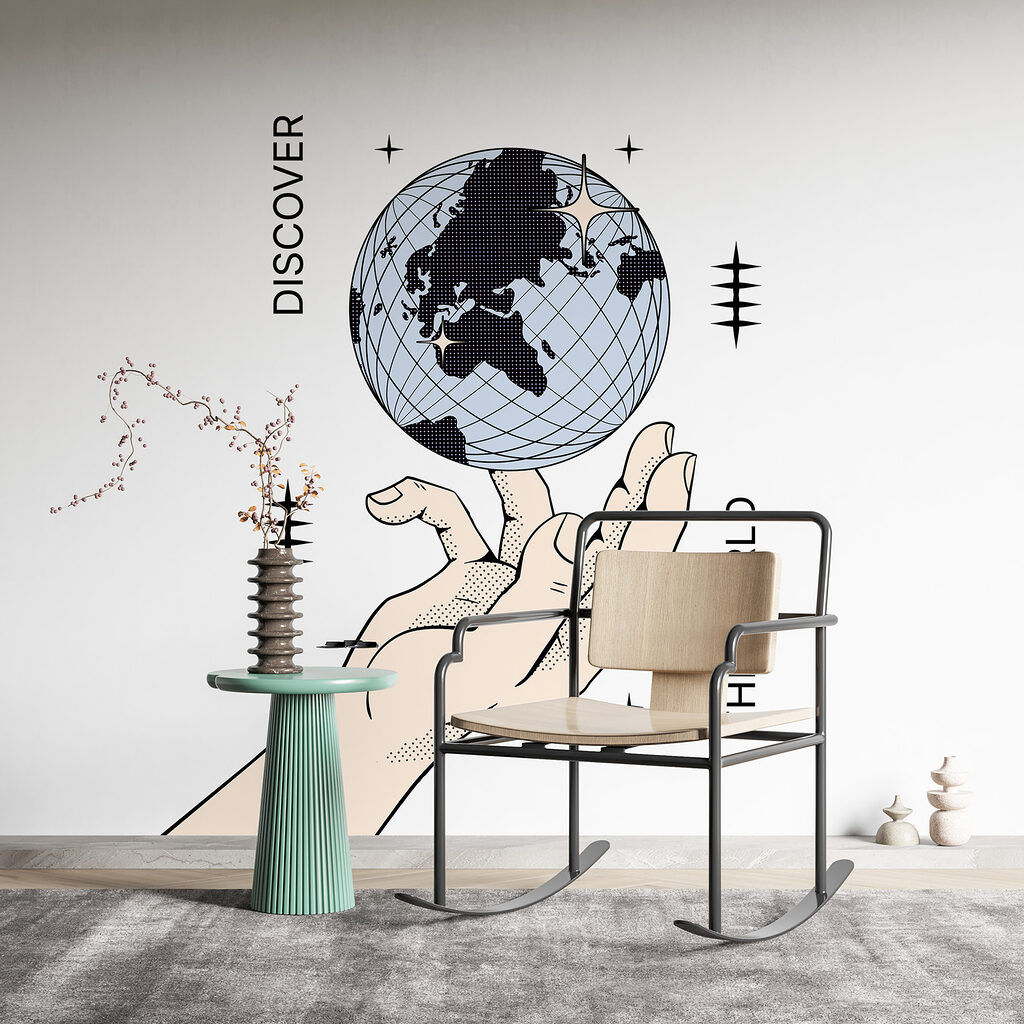 Hand holding a globe