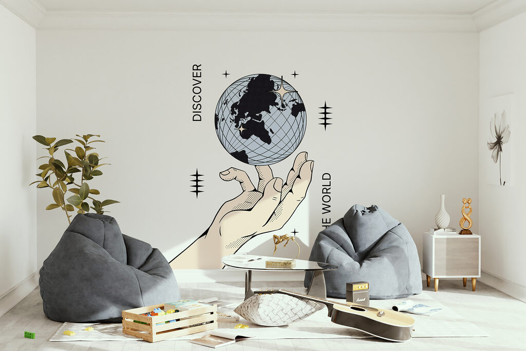 Hand holding a globe