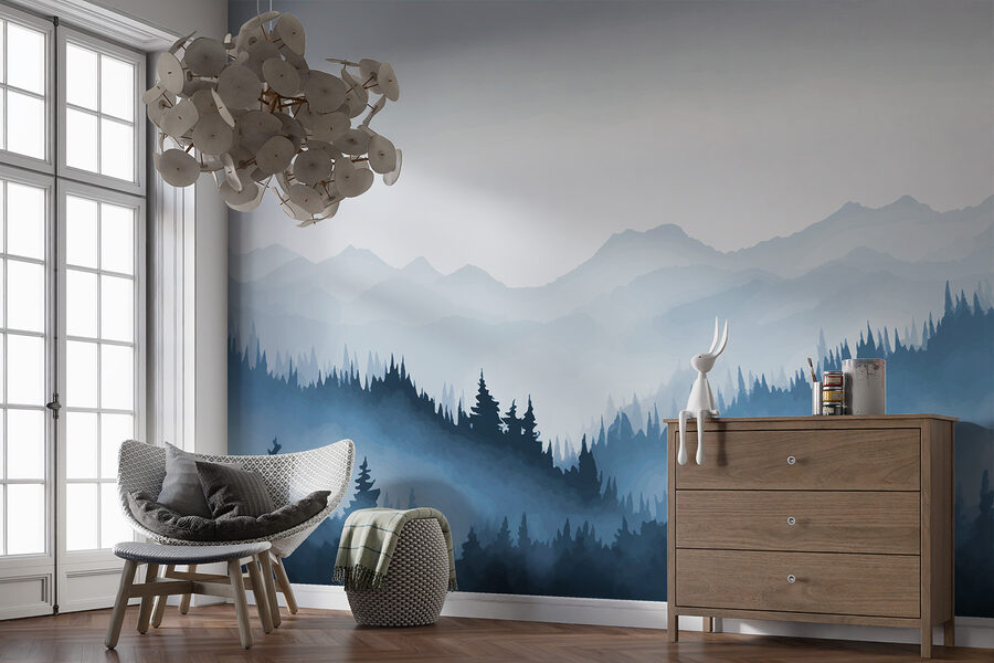 Foggy mountain landscape with trees and mountains