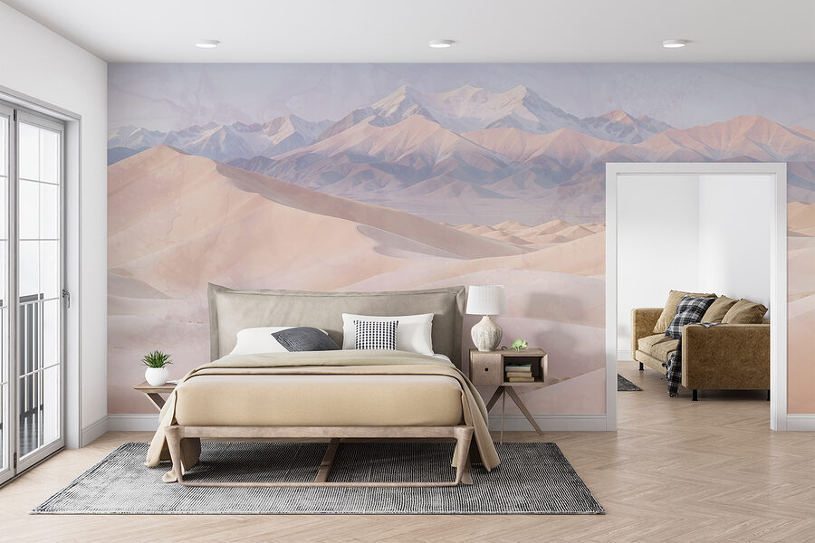 Sand dunes with mountains in the background
