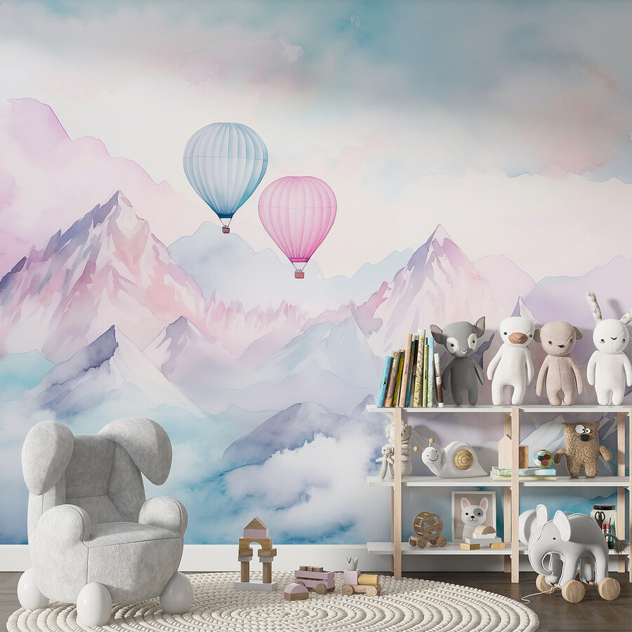 Group of hot air balloons in the sky over mountains