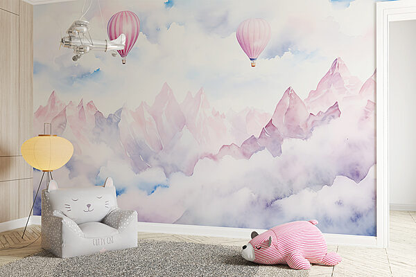 Group of hot air balloons in the sky above clouds