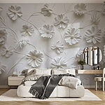 Wall mural White paper flowers on a white surface