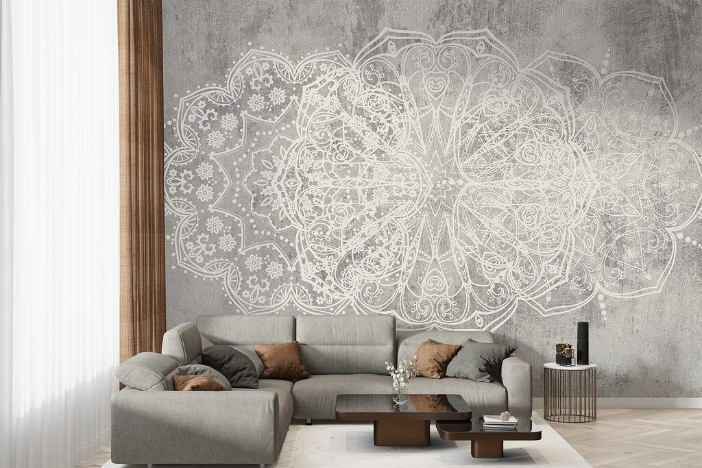 White ornate design on a grey surface
