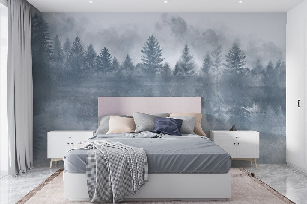 Foggy forest with trees reflected in water