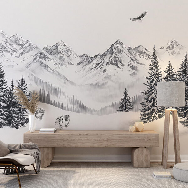 Snowy mountain landscape with trees and a bird flying over it