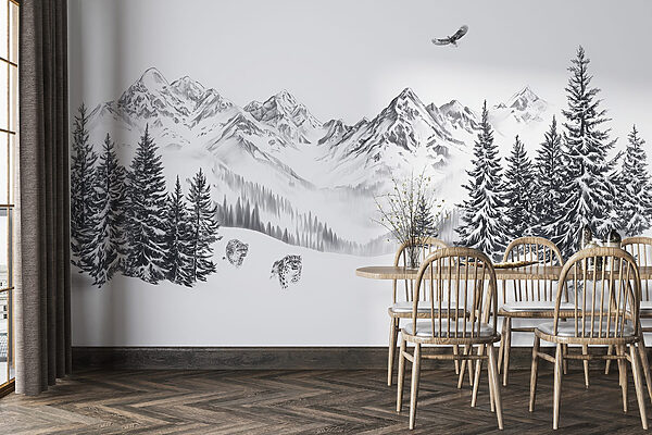 Snowy mountain landscape with trees and a bird flying over it