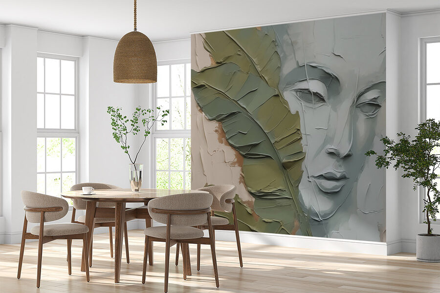 Painting of a face and a leaf Painting of a face and a leaf