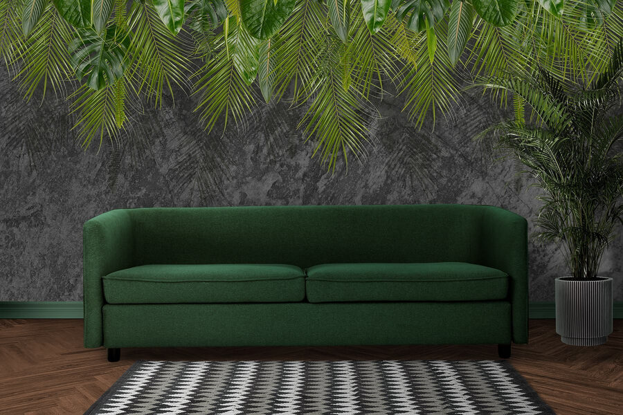 Group of green leaves on a grey background