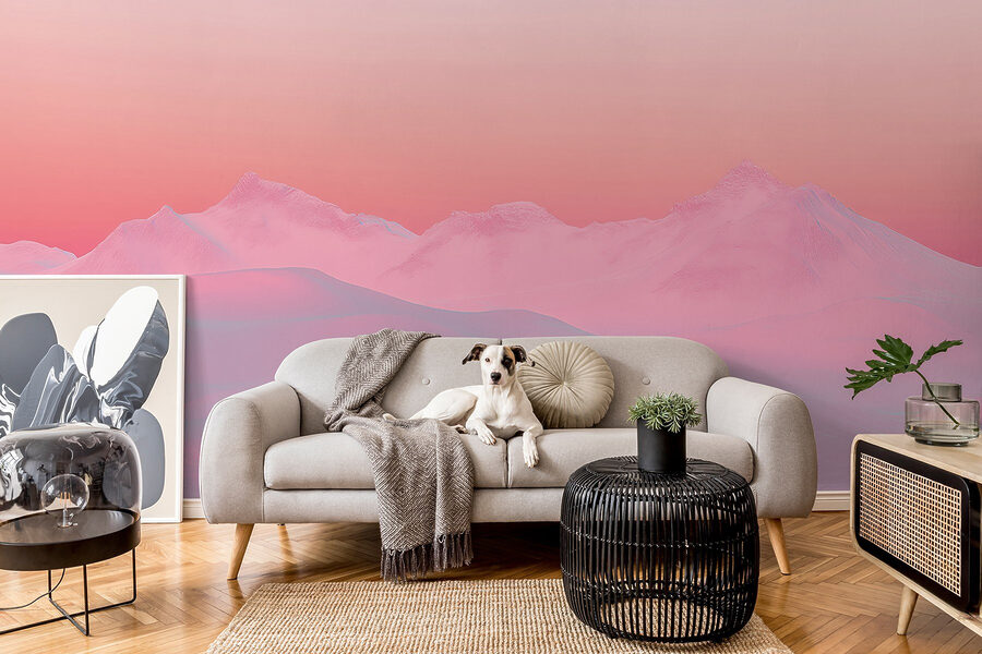Pink and blue sky over a snowy mountain range
