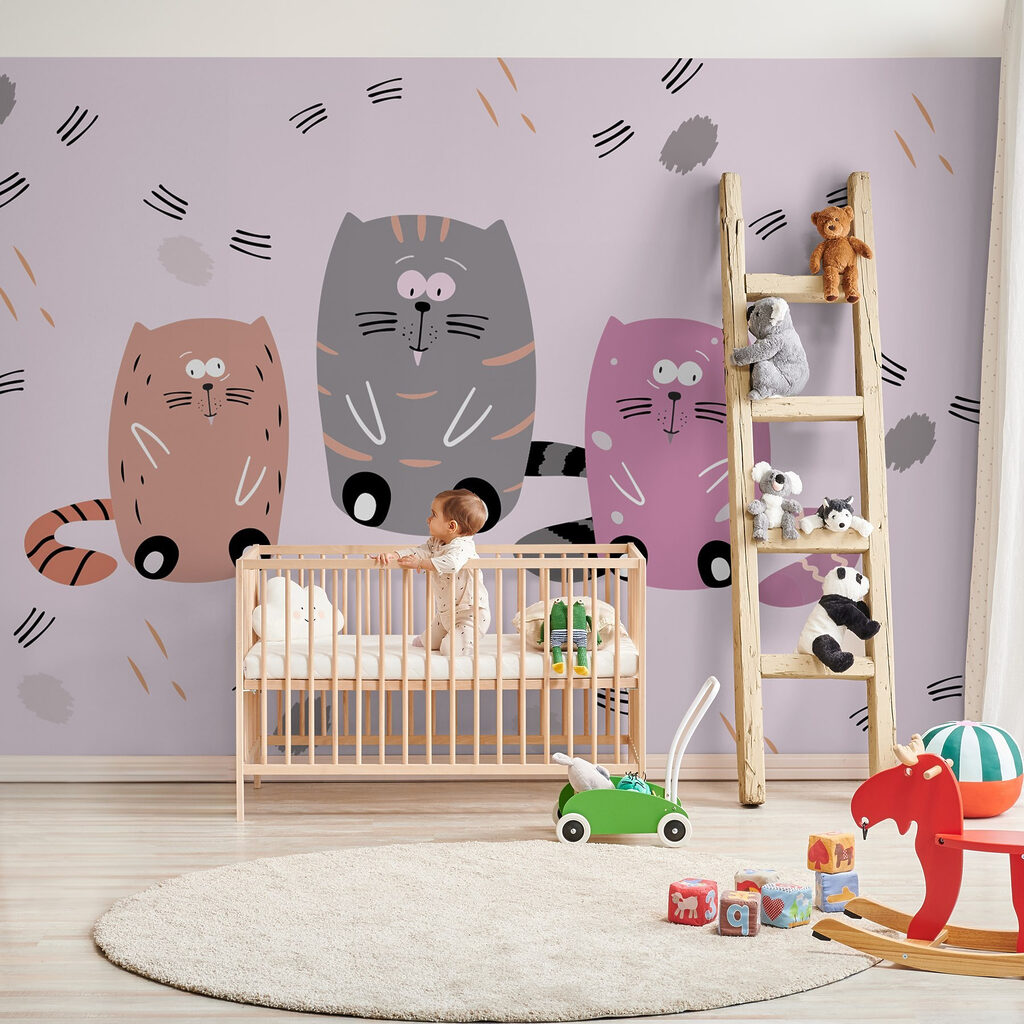 Group of cats sitting on a pink surface