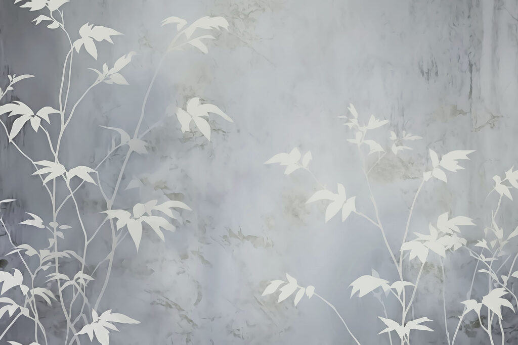 White leaves on a grey surface White leaves on a grey surface