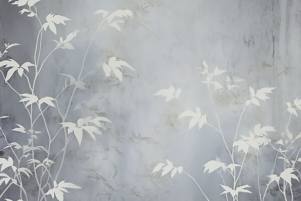 White leaves on a grey surface White leaves on a grey surface