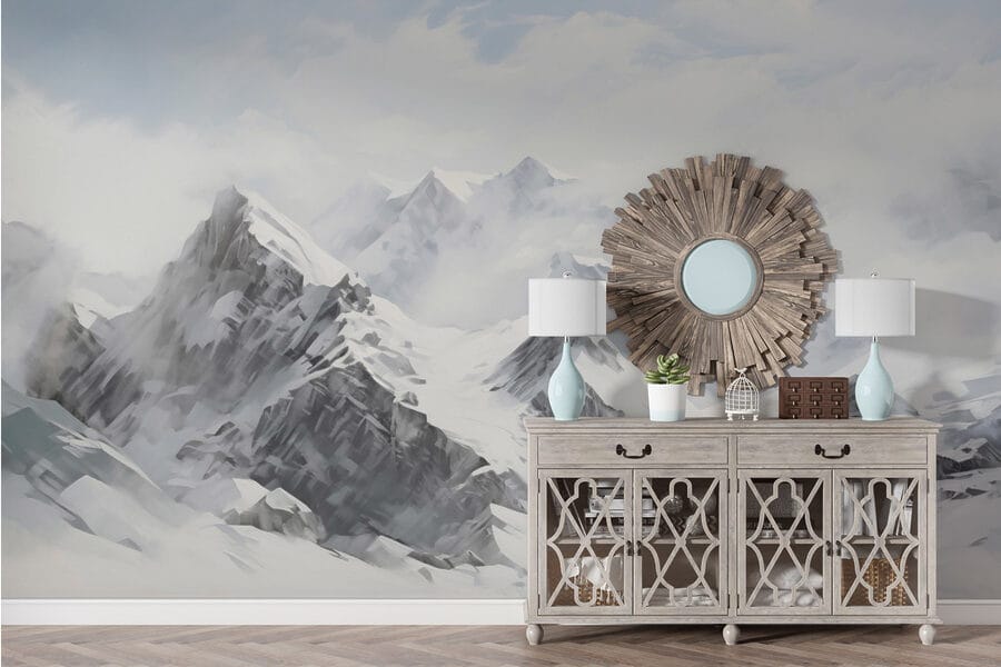 Snowy mountain range with clouds