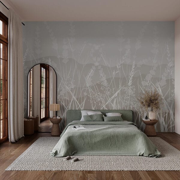 Field of grass with a mountain in the background