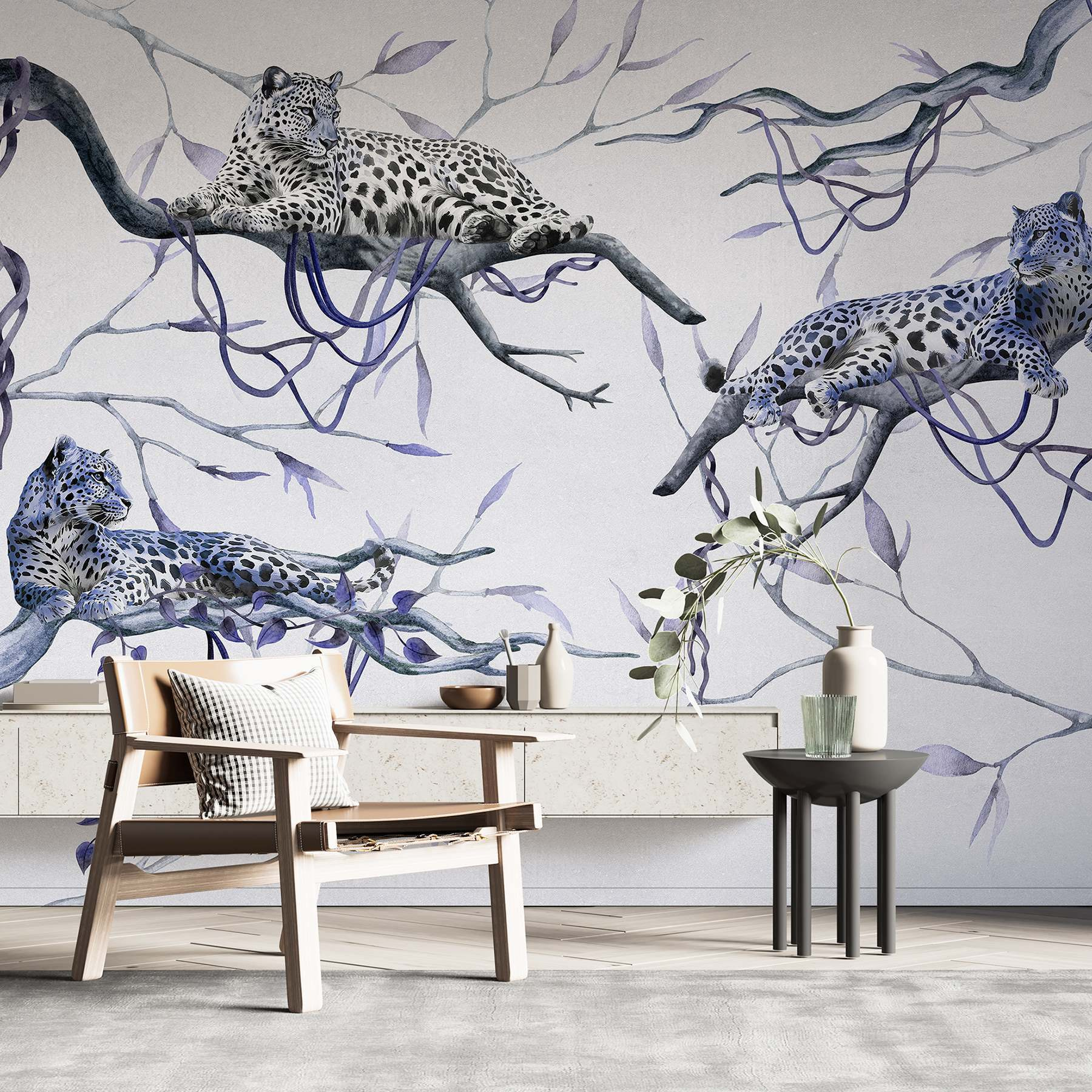 Group of leopards lying on branches