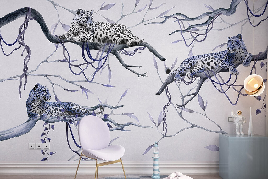 Group of leopards lying on branches