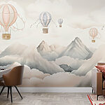 Wall mural Group of hot air balloons in the sky above mountains