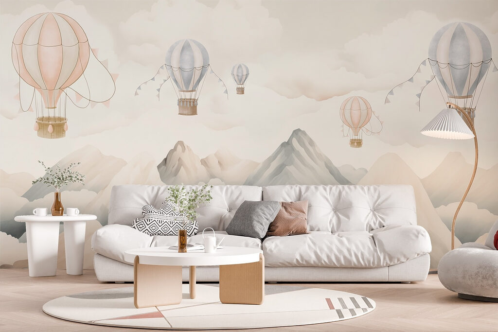 Group of hot air balloons in the sky above mountains