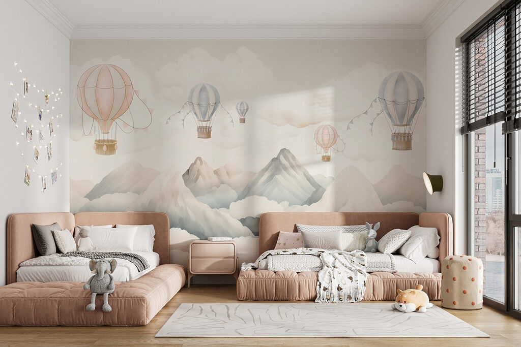 Group of hot air balloons in the sky above mountains