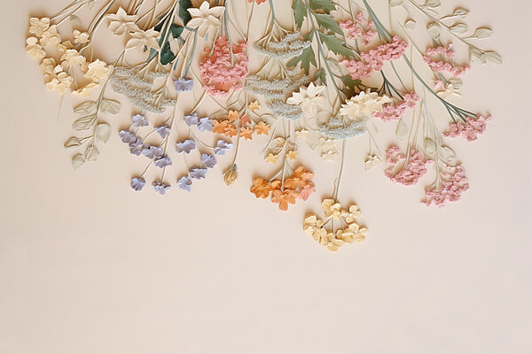 Group of flowers on a white surface Group of flowers on a white surface