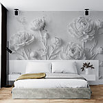 Wall mural White flower carving on a wall