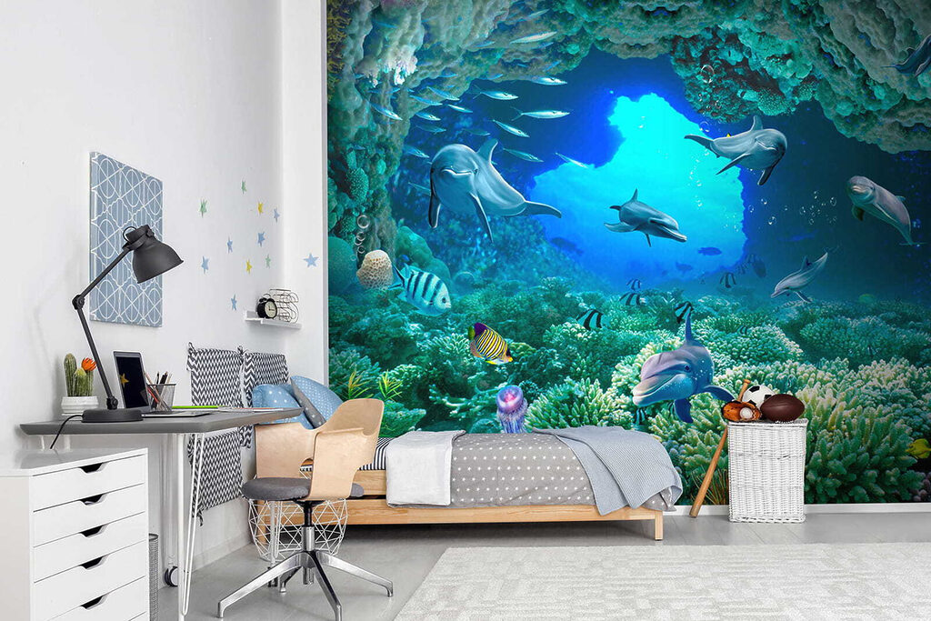 Group of dolphins and fish under water