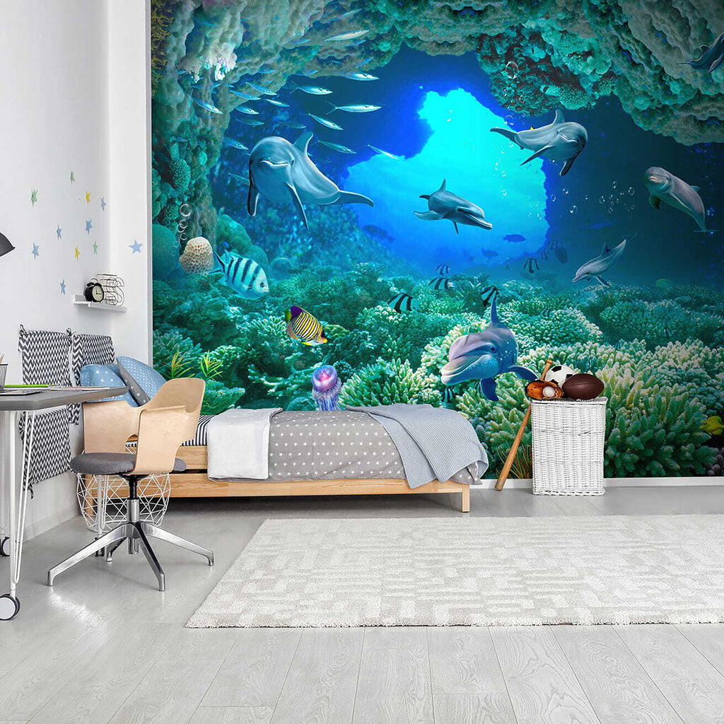 Group of dolphins and fish under water