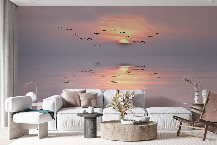 Flock of birds flying over water Flock of birds flying over water