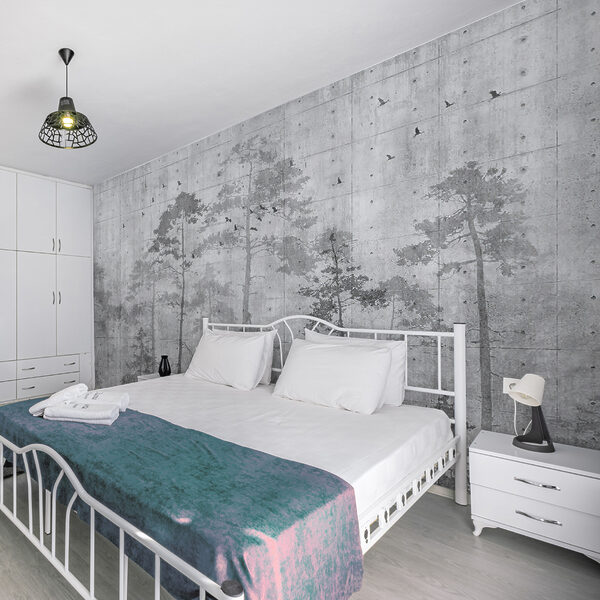 Grey wall with trees and birds Grey wall with trees and birds